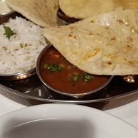 Thali hiding under all the gorgeous bread at SuRano Plant Based Indian bistro in Beeston