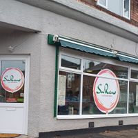 Lovely, clear signage outside at SuRano Plant Based Indian bistro in Beeston