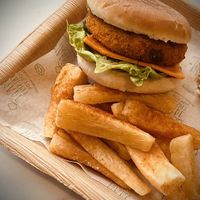 The Tikki Burger and Cassava Chips   at SuRano Plant Based Indian bistro in Beeston