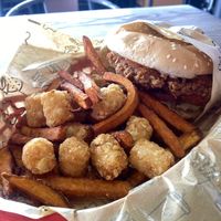 Vegan Meals Hate to See Me Coming - Before Devouring My Late Lunch - Tots, Sweet Potatoes, and Buffalo Chick’n 😛  at Nice Burger in Long Beach