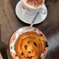 Soy cappuccino & vegan raisin pastry   at Pâtisserie - Salon de thé Léone in Toulouse