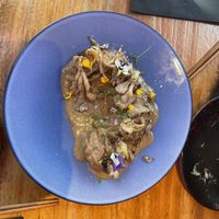 Tempeh with mushrooms   at Desoriente - Poblenou in Barcelona