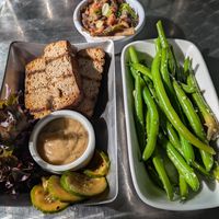 Tofu a la carte with ginger miso sauce, seasonal vegetables (green beans), and "beans and greens" at Stonecat Cafe in Hector