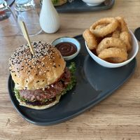 Magic Mushroom Burger (vegan) with onion rings  at Kovas in Schoenaich