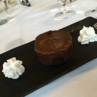 Chocolate Decadence Cake with Coconut Whipped Cream  at The Veraisons Restaurant in Dundee