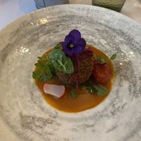 The main course options include a succulent black rice croquette served with a creamy vegan tomato sauce...  at Brocoli in Lyon