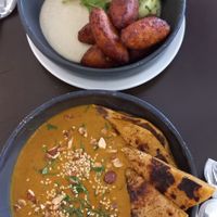 Buñuelos de maíz 🌽 y sopa curry de cabutia 😍🙏🏿  at Puerta in Buenos Aires