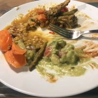 dal, curry, carrots, guac, 3/4 eaten   at 7030 Restaurant in Winterthur