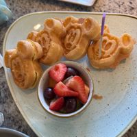 Allergy friendly Mickey waffles with fruit at Grand Floridian Cafe in Lake Buena Vista