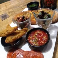 Sharer board - a generous range of delicious items and freshly made sauces!  at Vegan Pizza Bar in The Hague