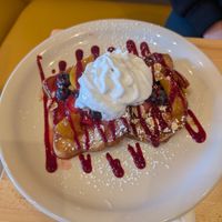 Vegan French Toast (with spiced peaches, strawberries, blueberries, raspberry compote) at WHOLEY GRANOLY in Bolingbrook