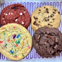 Vegan box! Clockwise from top left: Vegan Red Velvet special, Chocolate chunk, Double chocolate chunk, Birthday Cake 🎉   at Insomnia Cookies in Dayton
