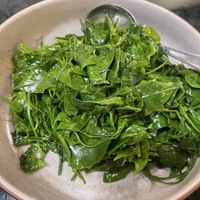 Stir fried leaves  at Baanying's Plant-Based Ying's Garden  in Bangkok