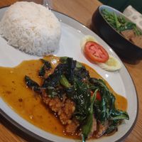 Basil chicken and rice at Baanying's Plant-Based Ying's Garden  in Bangkok