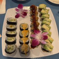 Left to right, shrimp tempura, dragon, crispy salmon, and green goddess rolls   at The Sushi Samurai - Queen Anne in Seattle