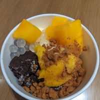 Pineapple sorbet with choice of toppings at YogurtLand in Dubai