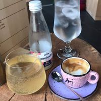 Local kombucha and small macchiato with oat milk  at Život Caffe in Porec