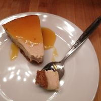 Cheesecake with passion fruit sauce at Copper Branch in Rotterdam