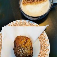 chai latte and a cinnamon bun at Encanto - Art Cafe in Helsinki