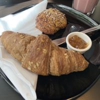 Cinnamon roll, crosaint with jam  at Encanto - Art Cafe in Helsinki