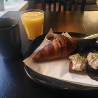 Croissant with jam and cheese, and daily specialty at Encanto - Art Cafe in Helsinki