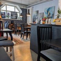 Seating space at Encanto - Art Cafe in Helsinki