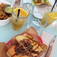 Hot-dog et tacos en arrière plan. at La Mifa in Toulouse