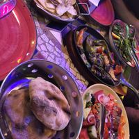 Bread, chips, salads en grilled vegetables   at Tymi in Tirana