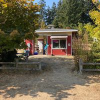 Osm eats, cute little hut with a herb garden behind.  at OSM Eats in Langley