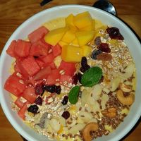 Mango smoothie bowl with granola on top at Vegan Meals in Chiang Mai