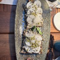 Seed cracker with radishes   at Capo Fronte in Rab