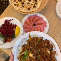 Naan bread, beetroot hummus, fattoush salad, side salad  at Lona Grill House & Juice Bar in Bristol