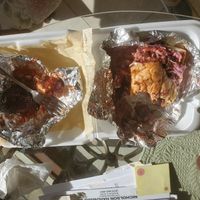 Vegan pulled pork BBQ sandwich with BBQ sauce Cauliflower Wings. So good I ate most of the the wings before thinking of talking a photo! at Jack it Up Vegan Eats in Rockford