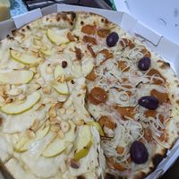 Half vegan "brie and apple". A little sweet. Half vegan caprese. at Francesca Pizzaria - Vila Planalto in Brasilia