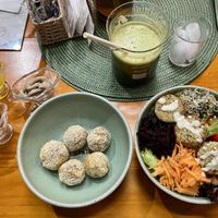 Lentil cakes, salad with falafel and green juice   at Esperança.Eco in Rio De Janeiro
