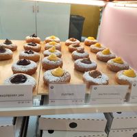 Raspberry Jam, Custard, Salted Caramel (not vegan) and Lemon Creme at Happy Dough in Chermside