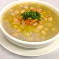 “ Balilah”  our Grabanzo Beans Dip. With Extra Virgin Olive Oil, Garlic, Lemon and Topped with Diced Tomato / Parsley.  at Alforon in San Diego