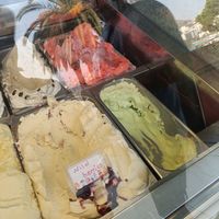 Pineapple (lowest one on the right) and pomegranate (the one above the pineapple) at Kayak Gelato & Frozen Yogurt in Sarande