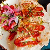 Quesadilla de bbq ( heura queso cheddar y salsa bbq) acompañado de ensalada riquísima at Velada in Barcelona