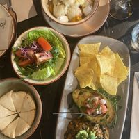 Baked avocado with beans and cauliflower with super tasty sauce  at Velada in Barcelona
