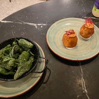 Bomba and grilled peppers  at Velada in Barcelona