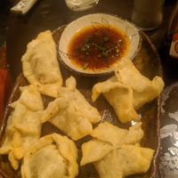Fried garlic gyoza! He asked our uni degree (environmental science) and shaped the gyozas for an environment theme (Bee, windmill, apple, flower, etc) at Yakuzenshokudo Chabuzen in Tokyo