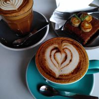 amazing cappuchino and mocha with pistachio milk! cake was not vegan at Ma Chill Coffee in Chiang Mai
