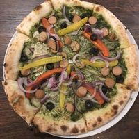 Vegan labelled pizza with Daiya cheese and Zero Meat sausage.  at Pizza Cucinova in Tokyo