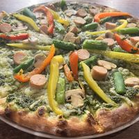 Basil base with Daiya cheese, Zero Meat sausage, peppers, mushrooms, and asparagus  at Pizza Cucinova in Tokyo