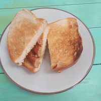 Vegan sausage on toast at The Buzzy Bee in Manchester