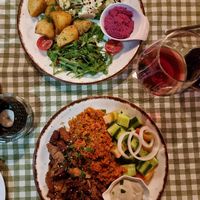 Afelia &  Cauliflower steak at Raphael's Restaurant in Ayia Napa