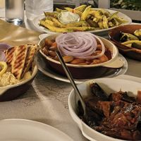 Hummus, fried courgette, stuffed vine leaves, beans, aubergine imam at Paspalis Restaurant in Kefalonia