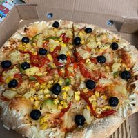 Vegan pizza with veg and pineapple   at Pizza Hut in Sao Miguel