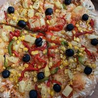 Vegan pizza with veg and pineapple   at Pizza Hut in Sao Miguel